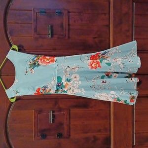 Swing dress with tie.